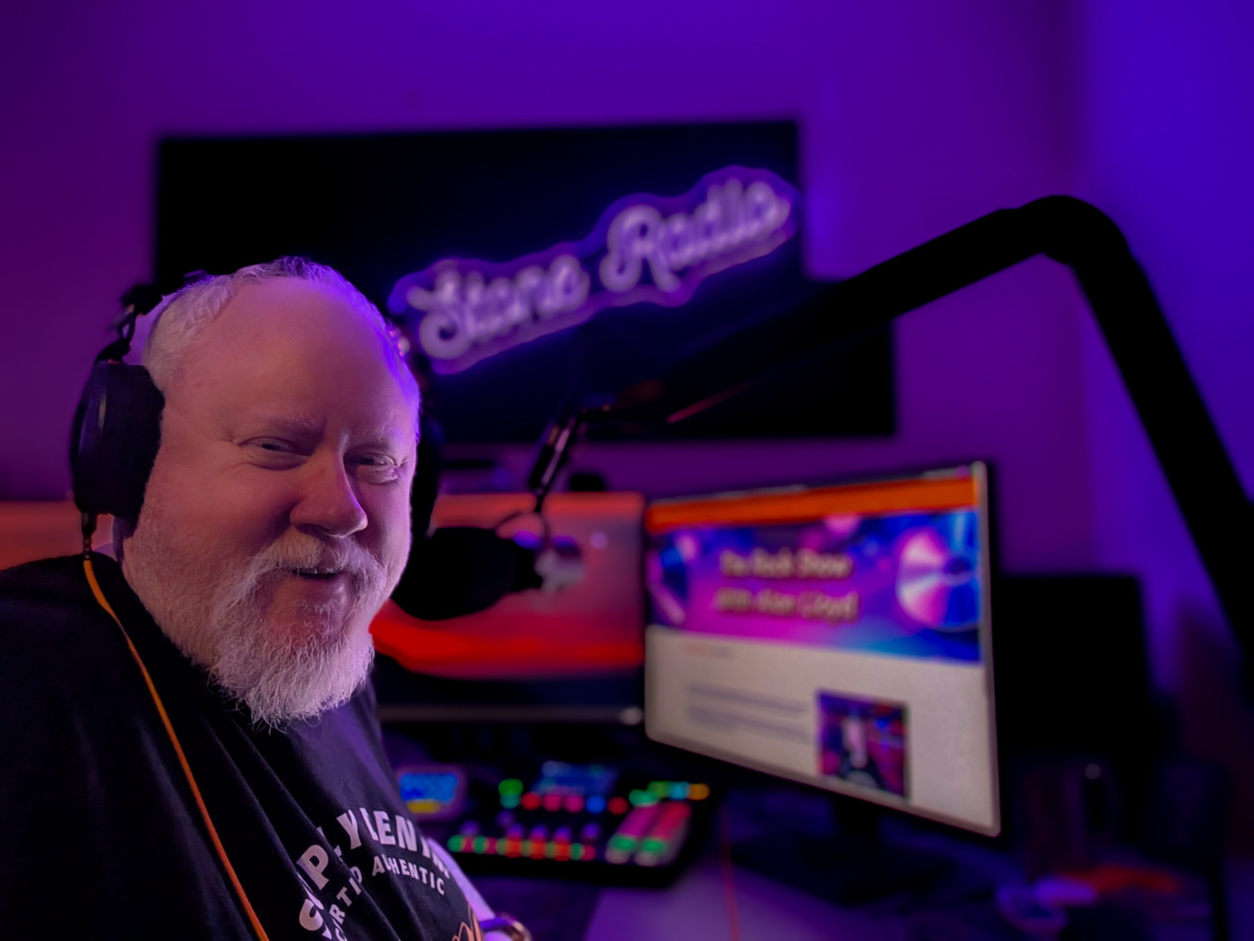 DJ Alan Lloyd on air, on Ore Stone Radio